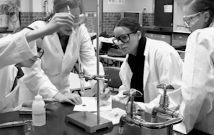 Plymouth Brethren children at school doing a science experiment