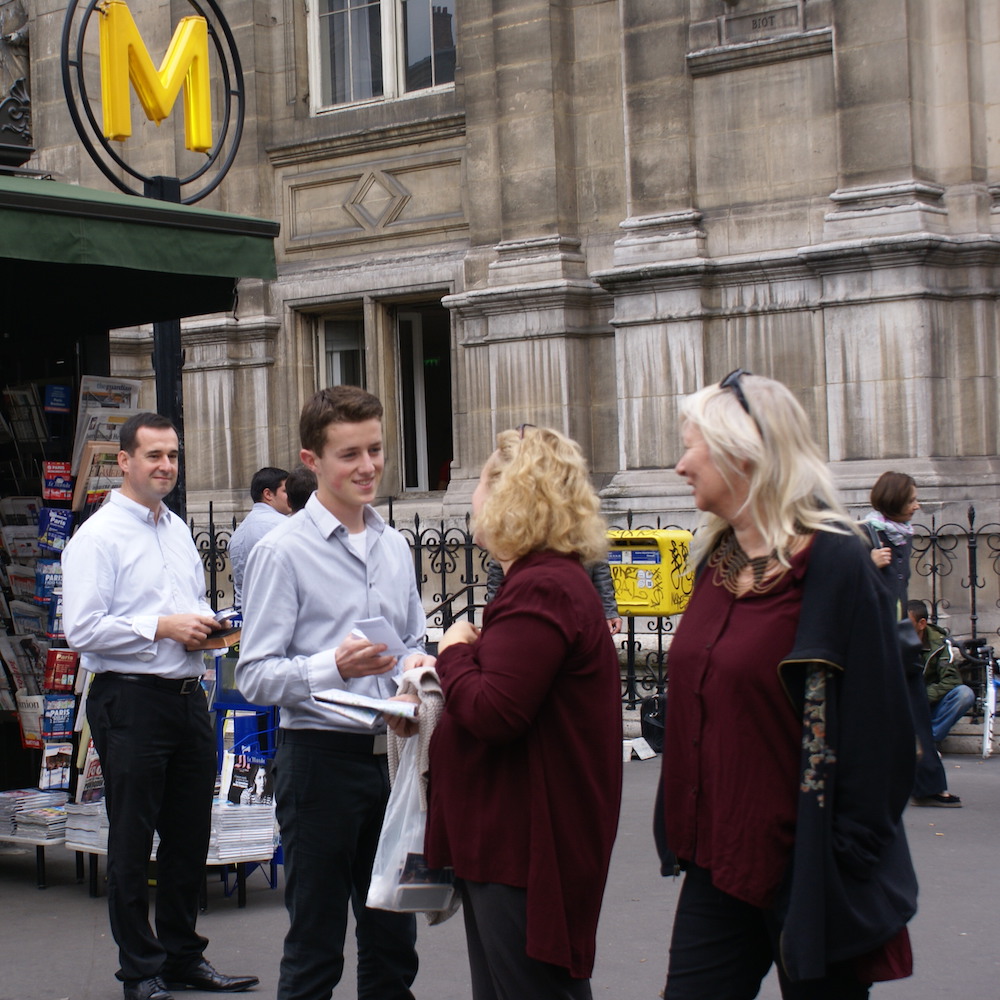 Young man preaching the Bible to the public in France